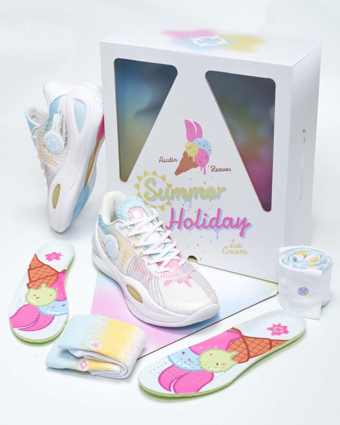 View of Austin Reaves white sneakers and box.